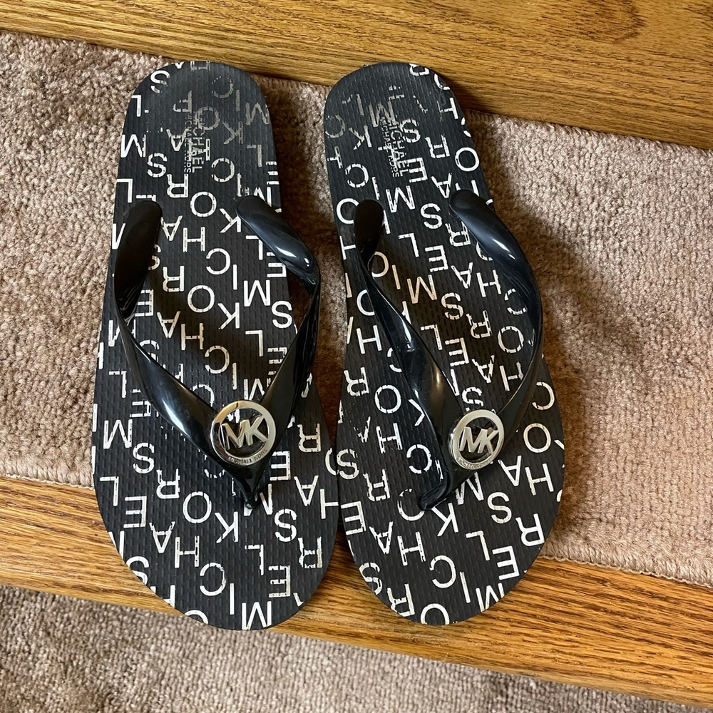 Michael Kors flip flops size 9